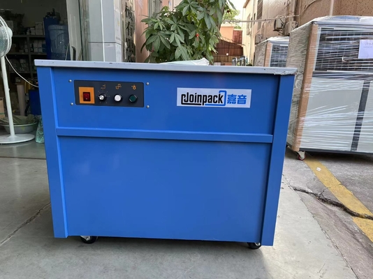 自動ドライブを半詰める機械を紐で縛るPPベルト手のバンディングのカートン箱