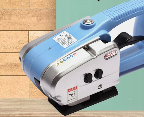 220V PPは革紐のパッキング機械電池の供給の手持ち型の紐で縛る機械をかわいがる